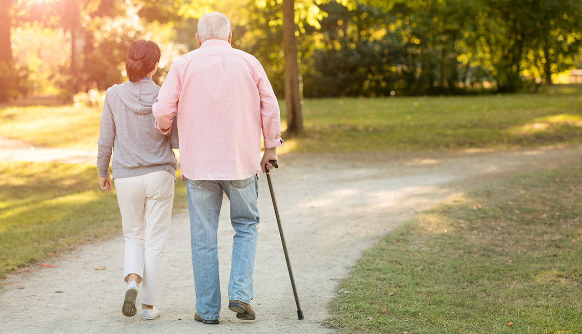 man walking with a cane
